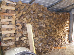 What can make a wood pile tip over?