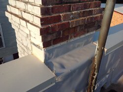 Could my TPO roof be in danger if flashed against chimney?