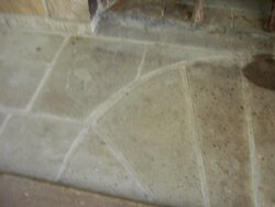 How do you remove smoke stains from stone hearth?