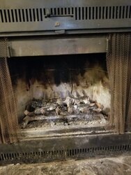 Installing a wood heater in a fireplace