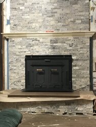 Installing Stone Veneer on Wall with Fireplace
