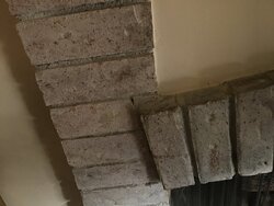 Can I remove the brick arch from my fireplace?
