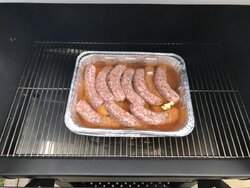 Amber beer Brats on a new GMG prime DBSSWF pellet grill 250 Deg F for a 3 hour smoke.