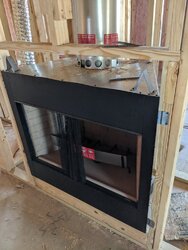 New home and new builder grade prefab fireplace