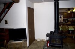 Heat shield behind wood stove - tiling advice