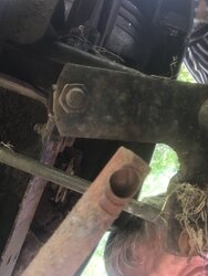 What is the best way to fix an LT-1000 tractor steering rod that popped off?