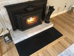 Flooring in front of hearth needing an extension