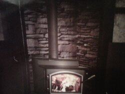 identify what kind of stone is behind this stove ??