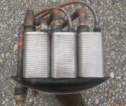 Three heat exchangers inside water heater.jpg