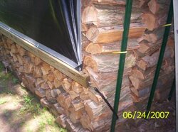 When to uncover wood pile?