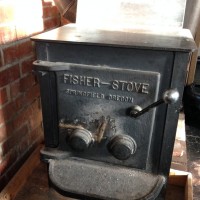 Fisher wood stove from the 70s? (though we likely bought it used at the time, so it could be older)