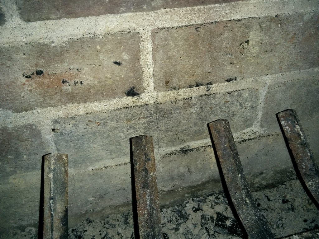 Cracked brick in old 1930's brick fireplace :(