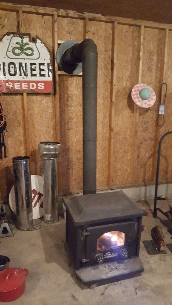 pipe wood stove chimney through wall with overhang (Dura Vent