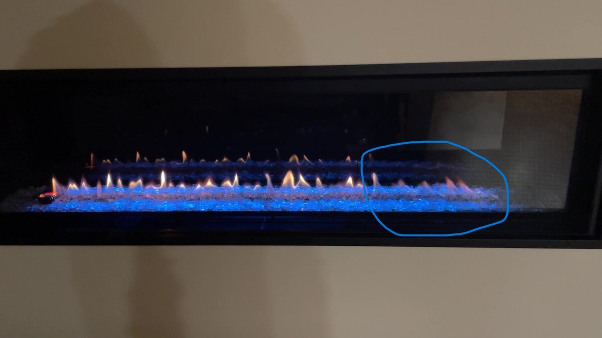 Direct Vent Fireplace windy flame on one side