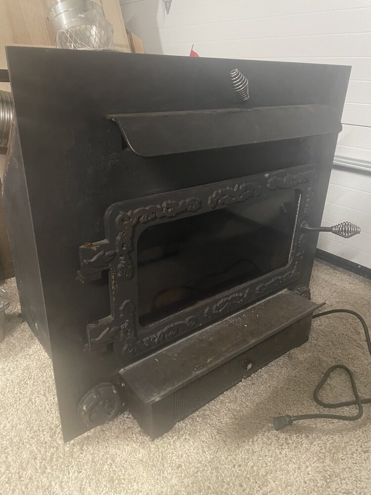 Need help identifying fireplace insert
