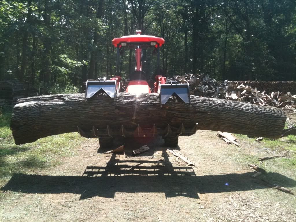 Root rake grapple for FW log harvest?