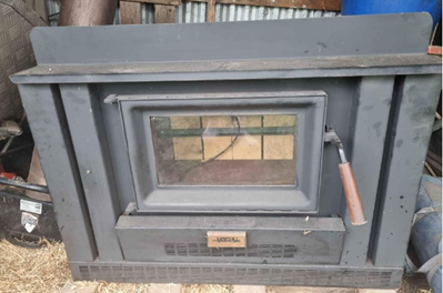 Installing an Arrow wood heater - Advice needed