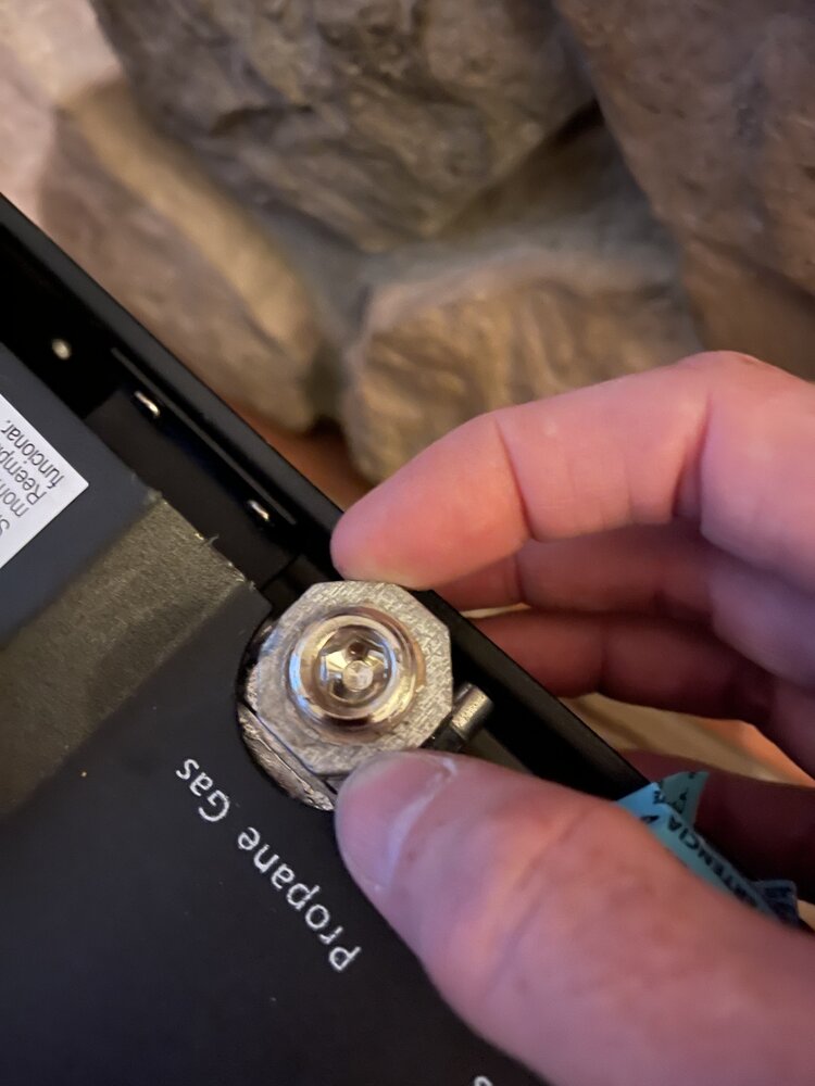 How to connect a gas log replacement myself… can’t get the threaded inlet out?