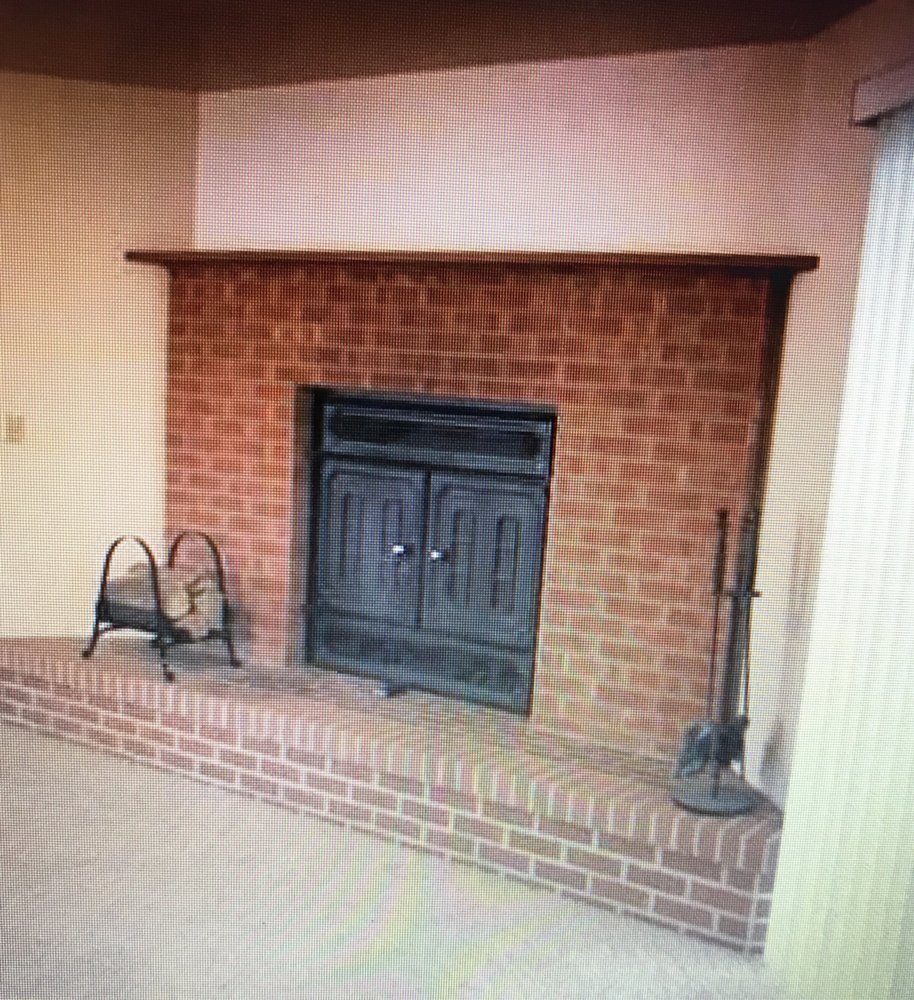 Can anyone identify this fireplace?