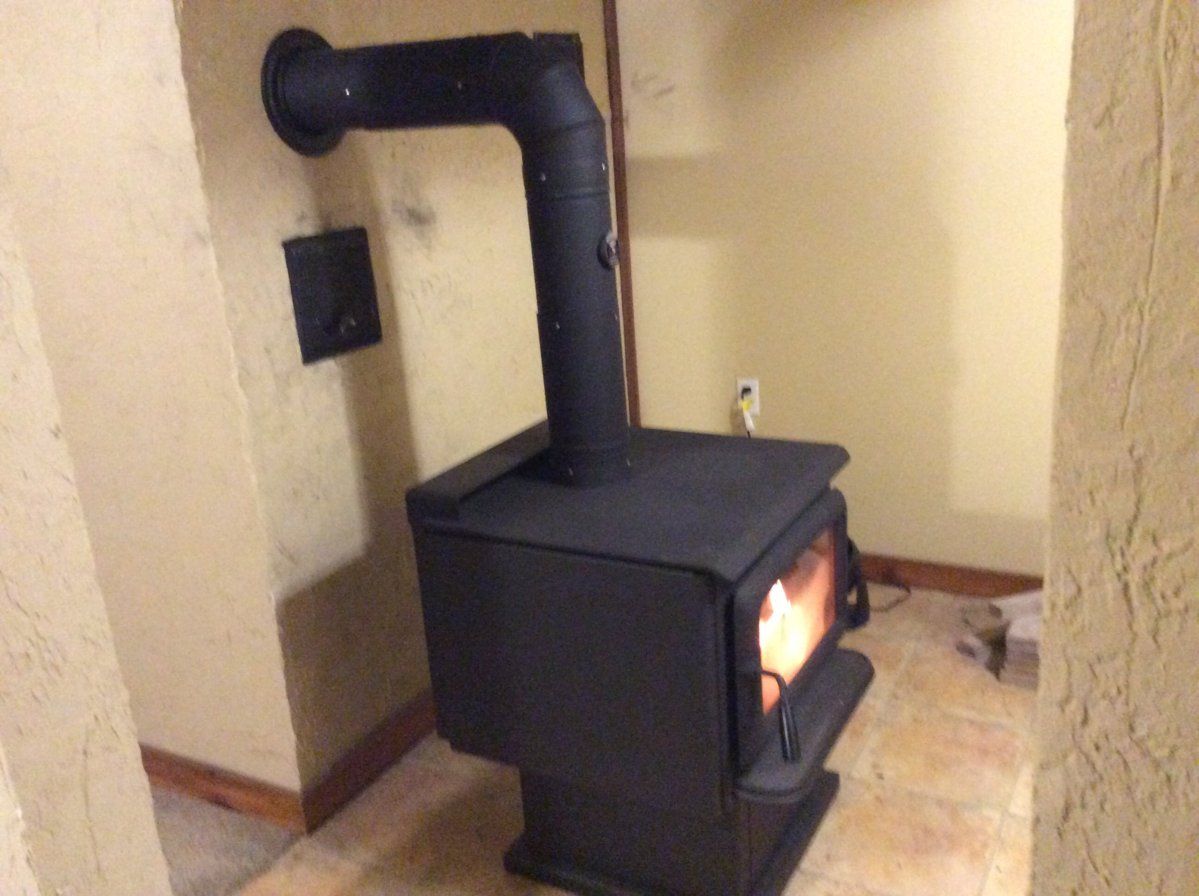 Safe temperatures around stove and masonry chimney?
