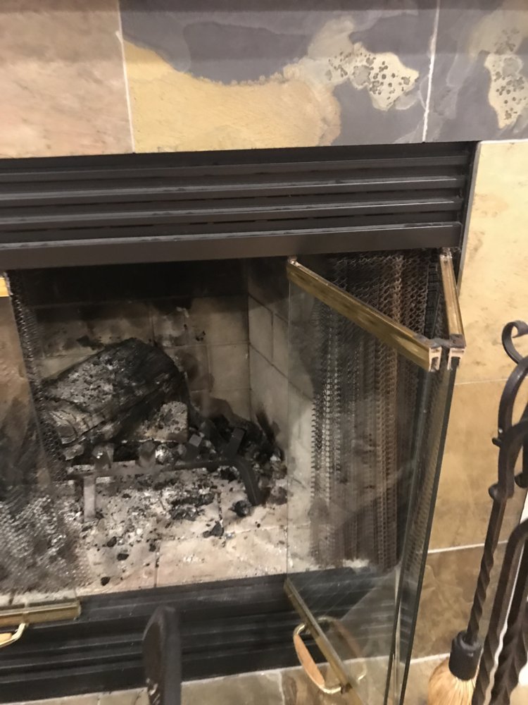 Wood burning fireplace surround