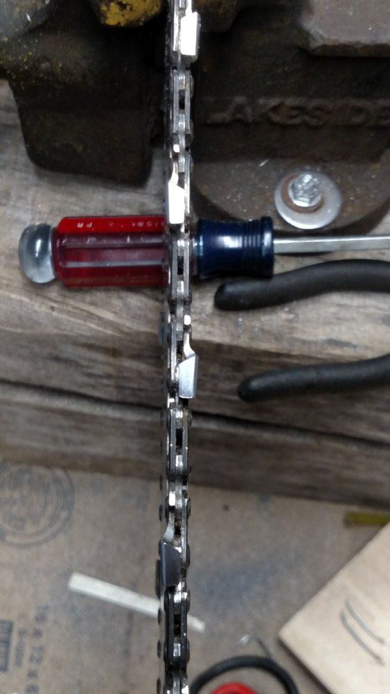 Husky 450 chain tightens up during use