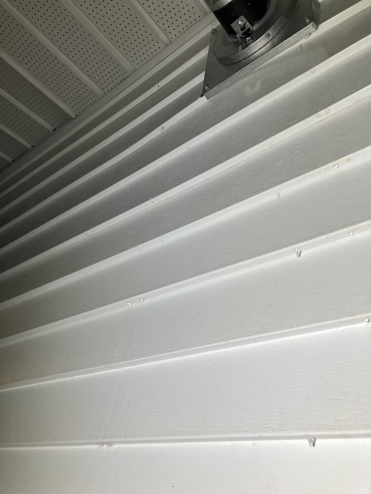 Fireplace flue sweating outside down my siding