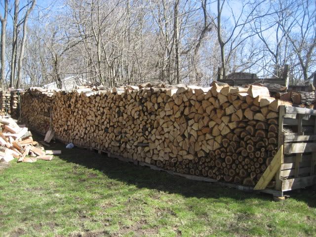 Some split red oak and wood piles.