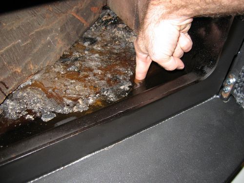 Water in my Fireplace Insert! *pics added*