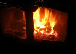 What happens when you throw a lump of coal on your wood stove?