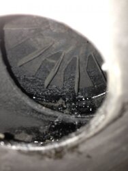 Wood pellet stove exhaust plenum goo! What is the cause?