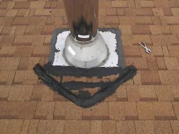 [Hearth.com] Roof is leaking rainwater down my stove pipe and pooling around my stove!