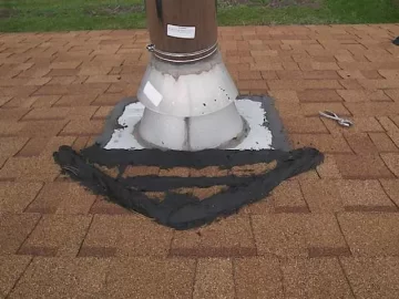 [Hearth.com] Roof is leaking rainwater down my stove pipe and pooling around my stove!