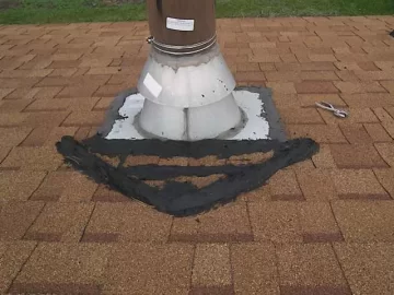 [Hearth.com] Roof is leaking rainwater down my stove pipe and pooling around my stove!