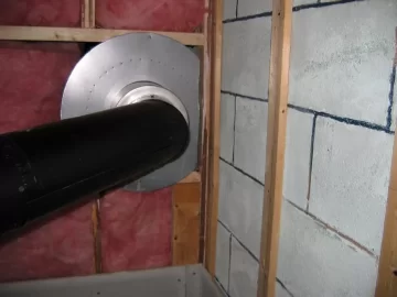 [Hearth.com] Can the chimney go through a wall at an angle?