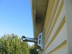 Suggestions for diverting vent soot from vinyl siding