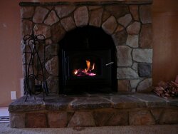 Fireplace face lift and new wood stove install completed