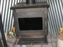 Please help me identify this wood burning stove.