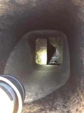 [Hearth.com] Install a liner in a chimney with brick and mortar  in the way