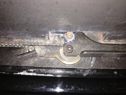 How do you tighten up the main door and ash drawer handles/Enviro M55.