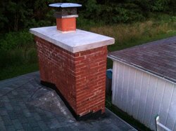 instead of repairing small cracks on chimney crown has anyone put on a chimney chase cover?