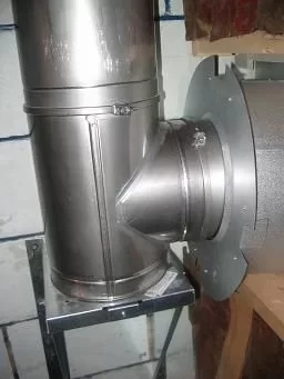 [Hearth.com] Can the chimney go through a wall at an angle?