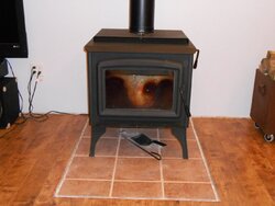 Stirring coals on Cat stove