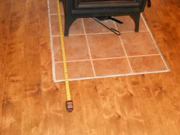[Hearth.com] Stirring coals on Cat stove