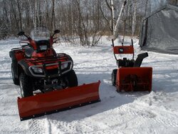 ATVs for Snaking Logs Out of the Woods