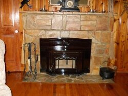 Looking for suggestions.... tired of this fireplace.