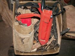 What do you use to carry your chainsaw tools in the woods?