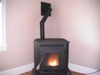 [Hearth.com] It's really windy here and getting a smokey smell inside the house...Is this normal?