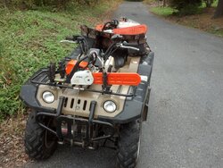 4 wheeler for wood hauler/plowing