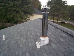 What are your opinions about a chimney near roof's ridgeline